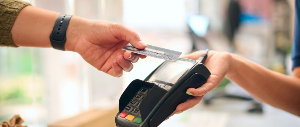 Person using a card for payment